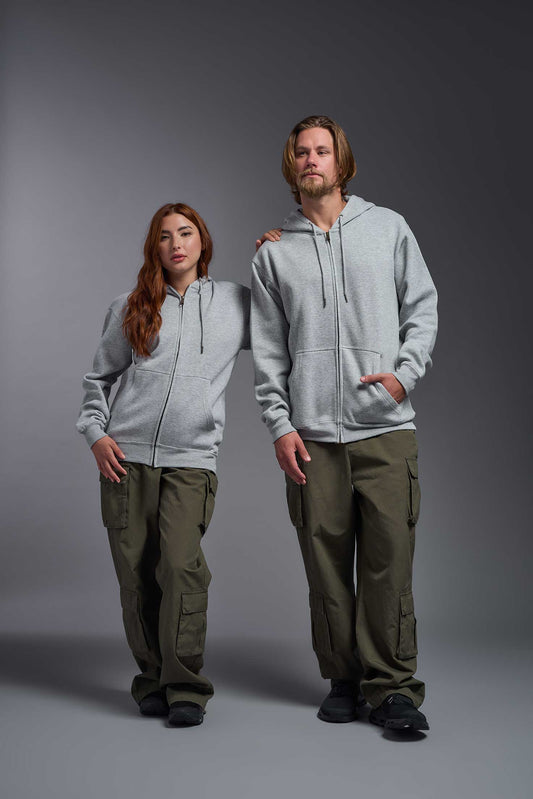 A male and female model wearing the unisex Americana 3-End Fleece Full Zip Hoodie in the color sport gray, made from 75% combed ring-spun USA-grown cotton and 25% polyester, showing the relaxed fit from a front view. This premium fleece hoodie is Made in the USA. #sport-gray