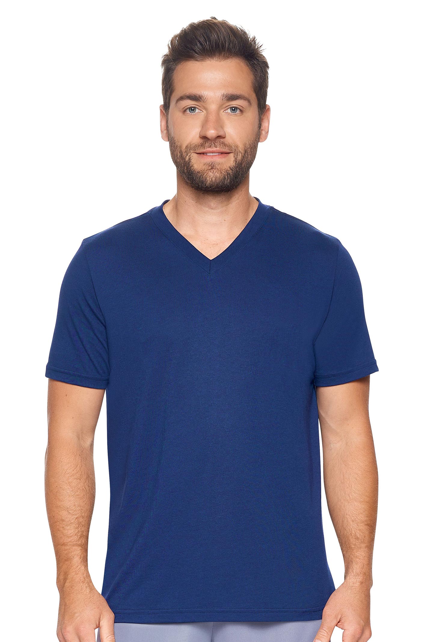 A male model with curly hair wearing the Men's MoCA V-Neck Tee in the color navy, made from a luxurious blend of 50% LENZING Modal and 50% Combed Ring-Spun Cotton, showing the relaxed fit from a front view. This fashion-forward, more sustainable t-shirt is elevated, eco-friendly, made in the USA, and available for bulk purchase. #navy