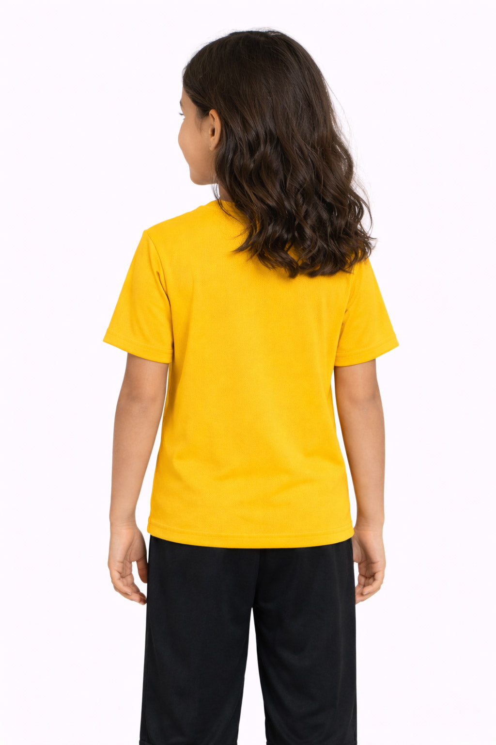 A youth model wearing the youth Oxymesh™ Crewneck Tech Tee in the color gold, made out of 100% polyester, showing the relaxed fit from a back view. This shirt wicks sweat, quick-dries, and eliminates odors for up to 30 UV protection. Made in the USA. #gold