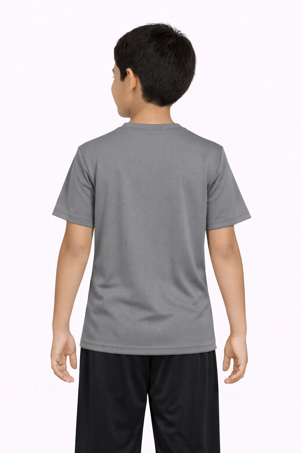 A youth model wearing the Oxymesh™ Crewneck Tech Tee in the color steel gray, made out of 100% polyester, showing the relaxed fit from a back view. This shirt wicks sweat, quick-dries, and eliminates odors for up to 30 UV protection. Made in the USA. #steel-gray