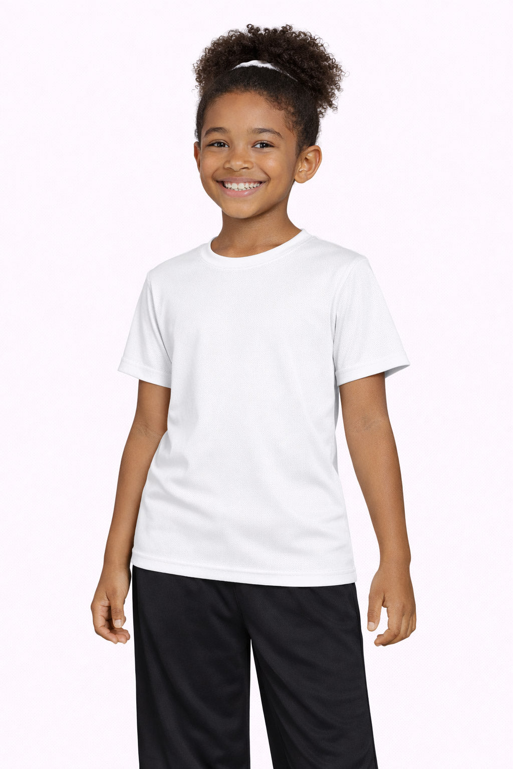 A youth model wearing the Oxymesh™ Crewneck Tech Tee in the color white, made out of 100% polyester, showing the relaxed fit from a front view. This shirt wicks sweat, quick-dries, and eliminates odors for up to 30 UV protection. Made in the USA. #white