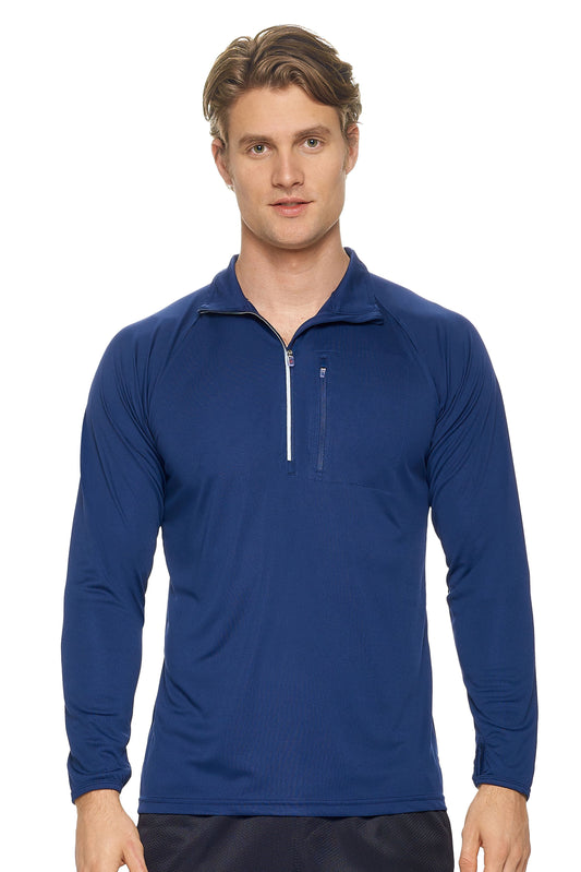A male model on a white background wearing the men's DriMax Raglan Half Zip in the color navy, made out of 100% polyester, showing the relaxed fit from a front view. This shirt wicks moisture, quick-dries, and inhibits odors. #navy