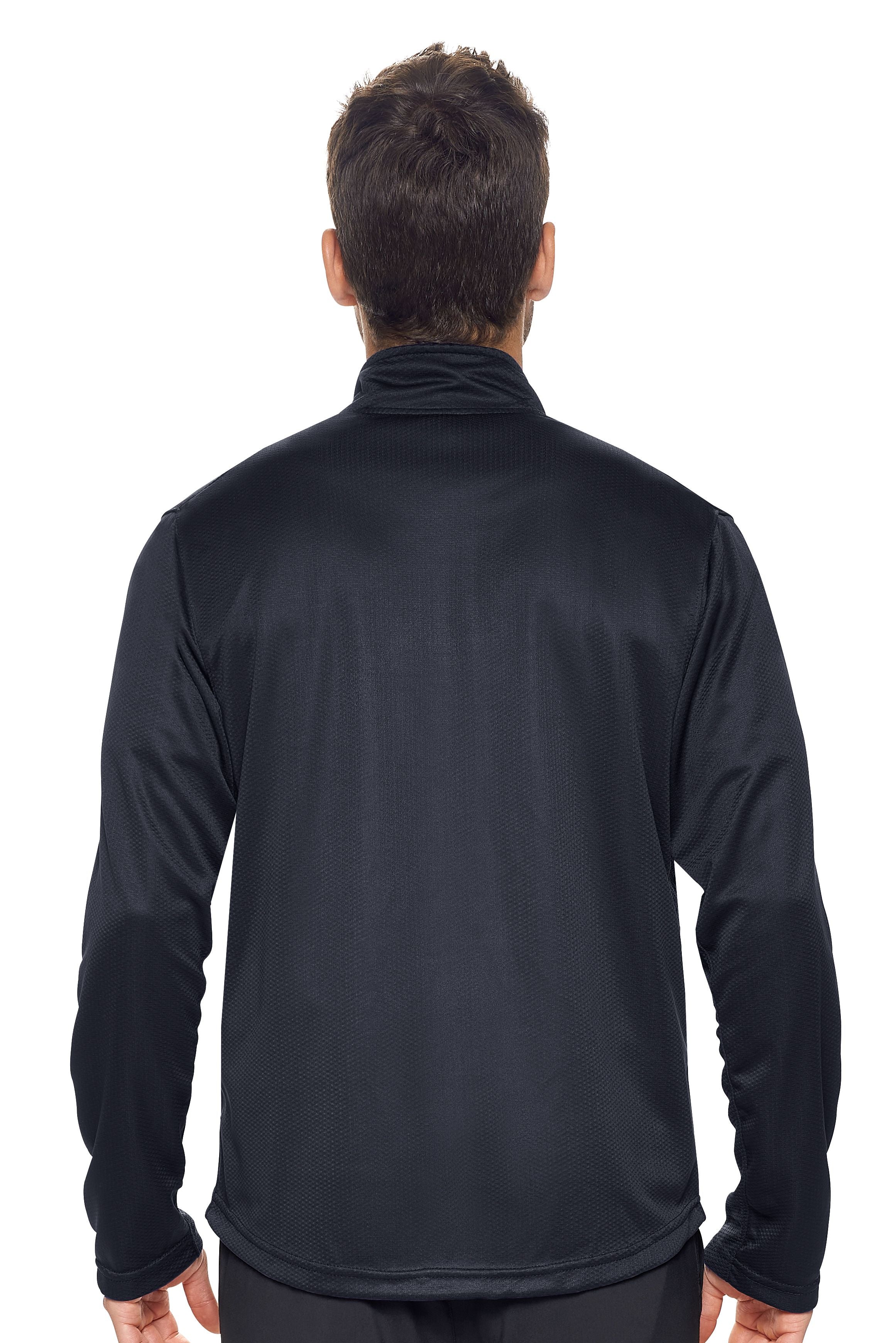 A male model on a white background wearing the men's Sphere Sportsman Jacket in the color black made out of 100% polyester showing the relaxed fit from a back view. This jacket quick-dries, wicks moisture and is made in the USA. #black