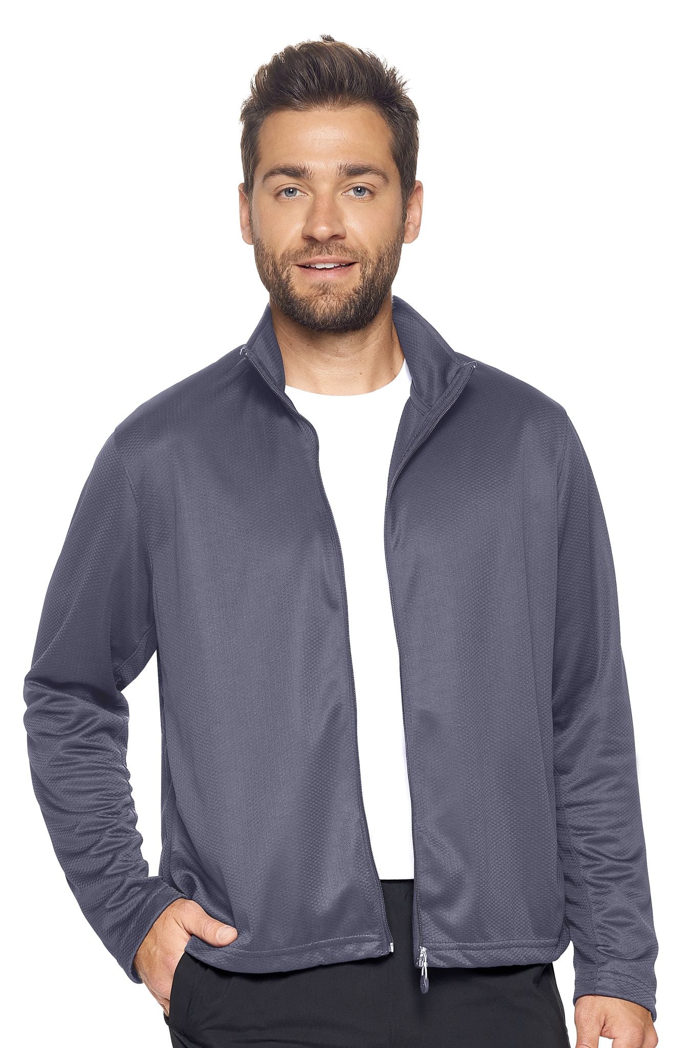 A male model on a white background wearing the men's Sphere Sportsman Jacket in the color charcoal made out of 100% polyester showing the relaxed fit from a front view. This jacket quick-dries, wicks moisture and is made in the USA. #charcoal