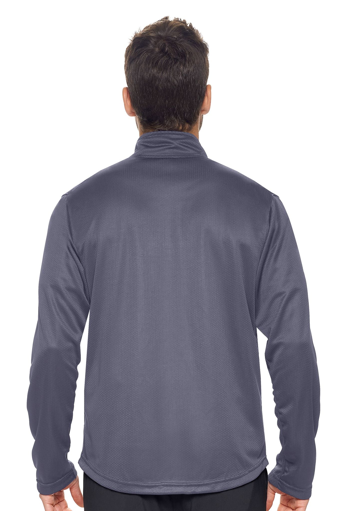 A male model on a white background wearing the men's Sphere Sportsman Jacket in the color charcoal made out of 100% polyester showing the relaxed fit from a back view. This jacket quick-dries, wicks moisture and is made in the USA. #charcoal
