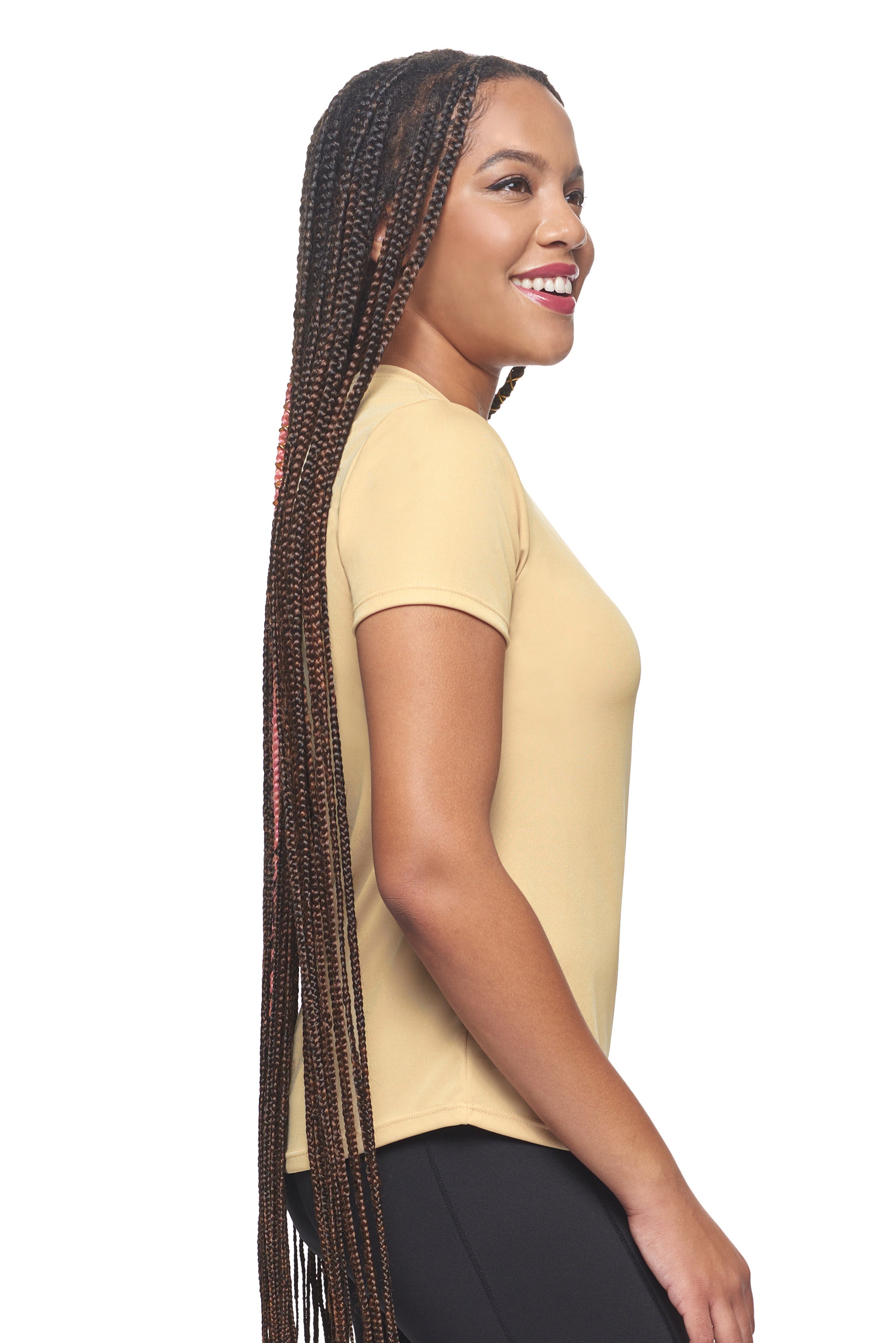 A female model wearing the women's DriMax Crewneck Expert Tee in the color vegas gold, made out of 100% polyester, showing the relaxed fit from a close-up collar view. This shirt is quick-drying, moisture-wicking, offers up to 30 upf protection and is made in the USA. #vegas-gold