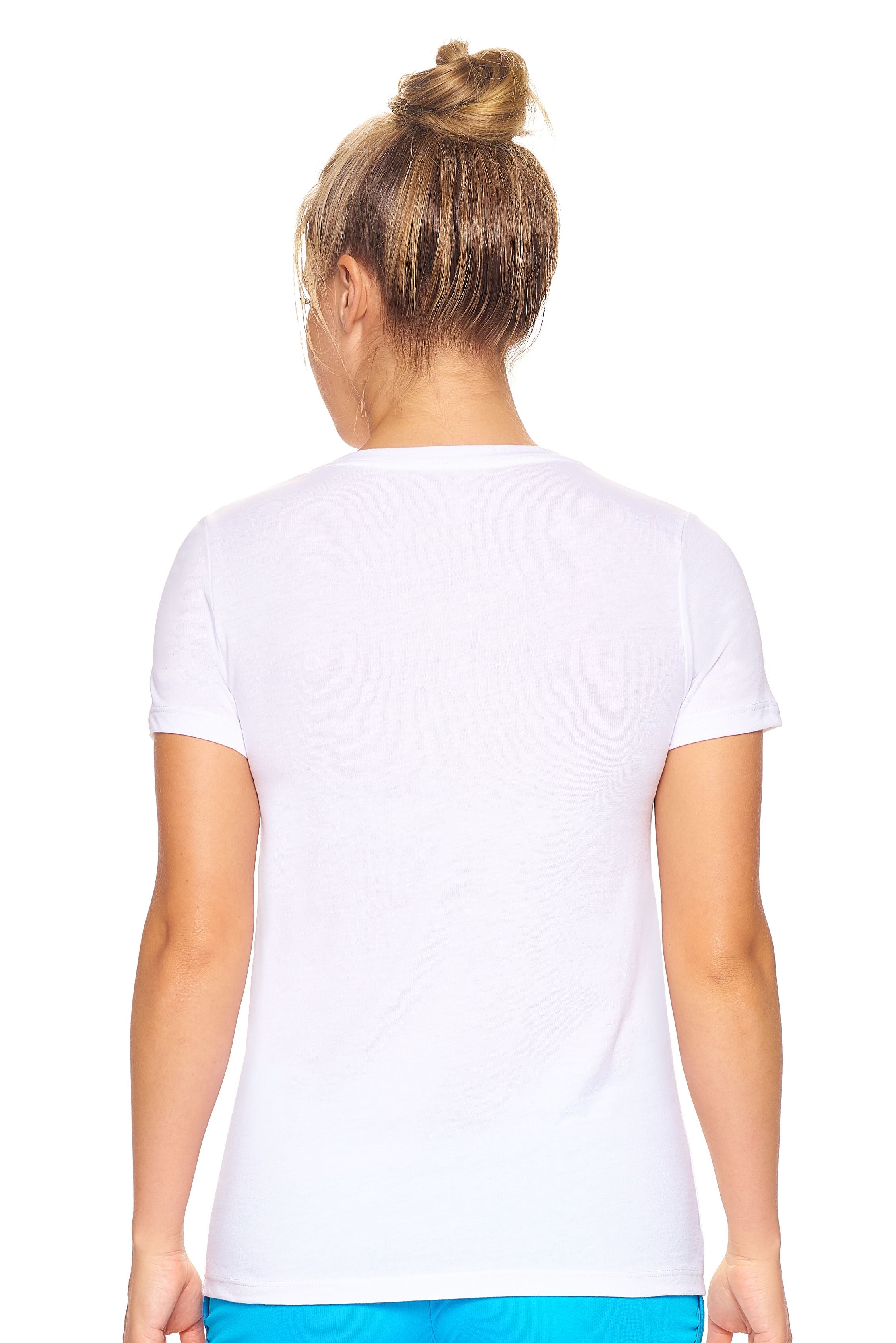 A female model with blonde hair wearing the women's MoCA Bay Crewneck Tee in the color white, made from a luxurious blend of 50% LENZING Modal and 50% Combed Ring-Spun Cotton, showing the feminine fit from a back view. This shirt is elevated, eco-friendly, made in the USA, and available for bulk purchase. #white