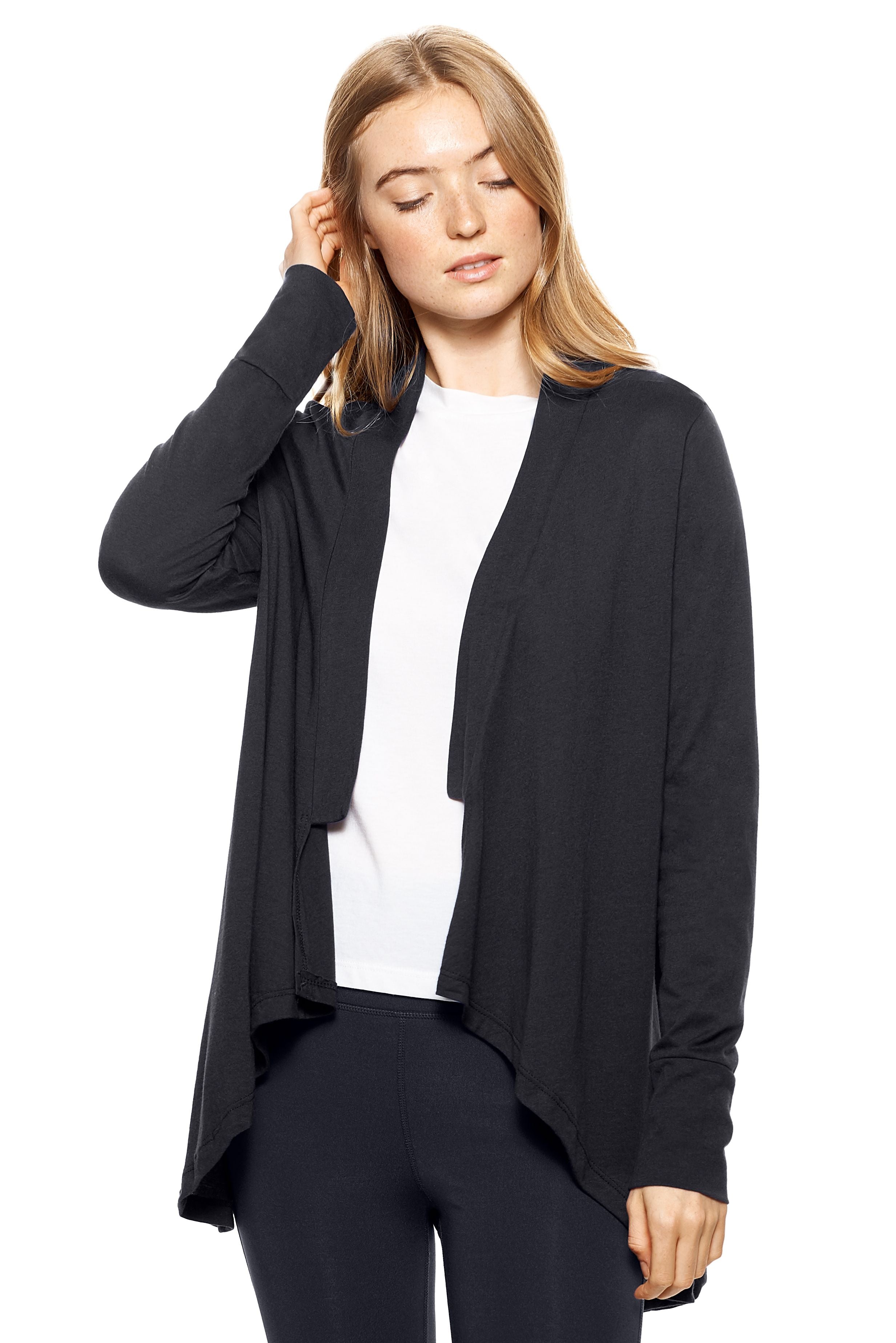 A female model with red hair wearing the women's MoCA Drape Front Cardigan in the color black, made from a luxurious blend of 50% LENZING Modal and 50% Combed Ring-Spun Cotton, showing the relaxed fit from a front view. This fashion-forward, more sustainable top is elevated, eco-friendly, made in the USA, and available for bulk purchase. #black
